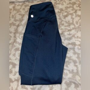 Athletic leggings. (pink the only one with no pockets)